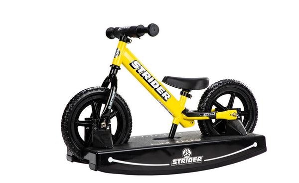 Strider bike with clearance rocking base